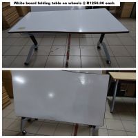 D10 - White board folding table on wheels @ R1250.00 each